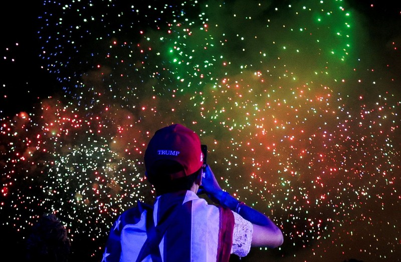 U.S. President Donald Trump watches fireworks explode during the Freedom 250's Salute to America as the United States celebrates its 250th anniversary on Independence Day, attempting the largest firework display in history with 850,000 fireworks in Washington, D.C., U.S., July 5, 2026. REUTERS/Jonathan Ernst