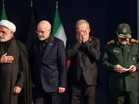 Chief Justice of Iran Gholamhossein Mohseni Ejei, Iran's parliament speaker Mohammad Baqer Qalibaf, Iranian President Masoud Pezeshkian and adviser to Iran's supreme leader Mohsen Rezaei attend a farewell ceremony for Iran's late Supreme Leader Ayato