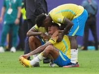 Soccer Football - FIFA World Cup 2026 - Round of 16 - Brazil v Norway - New York New Jersey Stadium, East Rutherford, New Jersey, U.S. - July 5, 2026 Brazil's Neymar, Raphinha and Vinicius Junior look dejected after the match as Brazil are eliminated