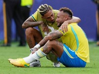 Soccer Football - FIFA World Cup 2026 - Round of 16 - Brazil v Norway - New York New Jersey Stadium, East Rutherford, New Jersey, U.S. - July 5, 2026 Brazil's Neymar and Raphinha look dejected after the match as Brazil are eliminated from the World C