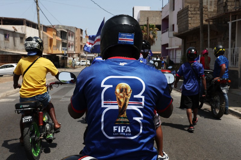 Soccer Football - FIFA World Cup 2026 - Cape Verde arrive home in Praia - Praia, Cape Verde - July 5, 2026 A drone view shows the Quebra Canela beach where Cape Verde fans gather with their national flags to welcome their players and celebrate their arrival from the United States REUTERS/Danilson Sequeira     TPX IMAGES OF THE DAY
