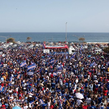Soccer Football - FIFA World Cup 2026 - Cape Verde arrive home in Praia - Praia, Cape Verde - July 5, 2026 A drone view shows the Quebra Canela beach where Cape Verde fans gather with their national flags to welcome their players and celebrate their