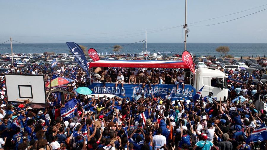 Soccer Football - FIFA World Cup 2026 - Cape Verde arrive home in Praia - Praia, Cape Verde - July 5, 2026 A drone view shows the Quebra Canela beach where Cape Verde fans gather with their national flags to welcome their players and celebrate their