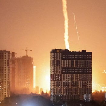 An explosion lights up the sky over the city during a Russian missile and drone strike, amid Russia's attack on Ukraine, in Kyiv, Ukraine July 6, 2026. REUTERS/Vladyslav Sodel