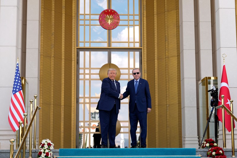 U.S. President Donald Trump shakes hands with Turkish President Recep Tayyip Erdogan during a formal arrival at the Bestepe Presidential Compound at the NATO summit in Ankara, Turkey, Tuesday, July 7, 2026.     Emrah Gurel/Pool via REUTERS