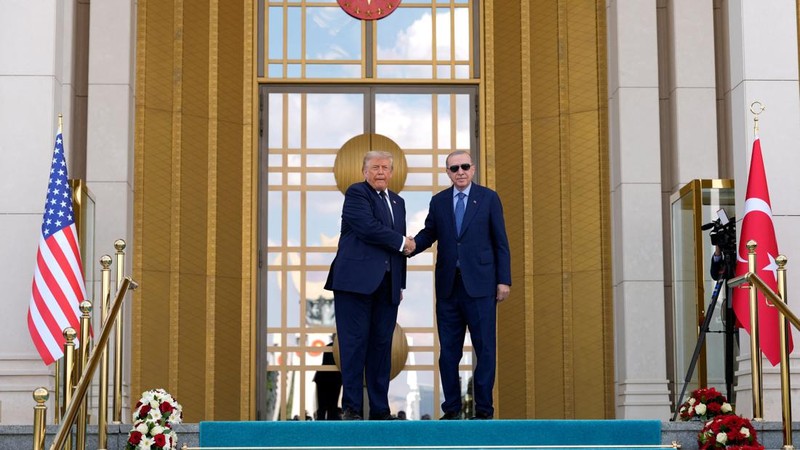 U.S. President Donald Trump shakes hands with Turkish President Recep Tayyip Erdogan during a formal arrival at the Bestepe Presidential Compound at the NATO summit in Ankara, Turkey, Tuesday, July 7, 2026.     Emrah Gurel/Pool via REUTERS