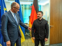 German Chancellor Friedrich Merz greets Ukraine's President Volodymyr Zelenskiy on the sidelines of the NATO leaders' summit in Ankara, Turkey, July 7, 2026. Michael Kappeler/Pool via REUTERS