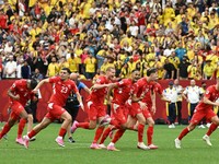 Soccer Football - FIFA World Cup 2026 - Round of 16 - Switzerland v Colombia - BC Place, Vancouver, Canada - July 7, 2026 Switzerland's Djibril Sow and teammates celebrate after the penalty shootout as Switzerland qualify for the quarter finals of th