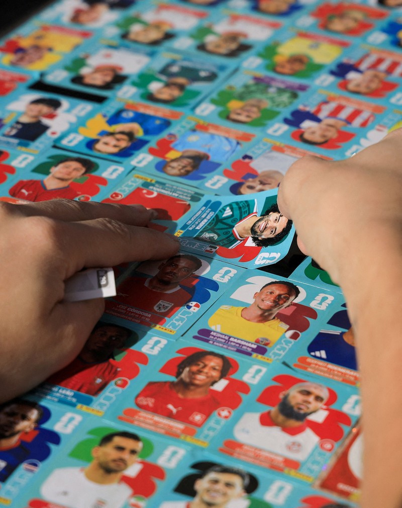 Chilean soccer fan and content creator Ariel Osses smiles while sitting in his car, which is covered with FIFA World Cup 2026 Panini stickers, fulfilling an updated version of his childhood dream of having a World Cup Panini album, in Santiago, Chile, July 6, 2026. REUTERS/Diego Reyes     TPX IMAGES OF THE DAY