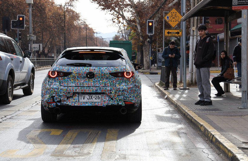 Chilean soccer fan and content creator Ariel Osses smiles while sitting in his car, which is covered with FIFA World Cup 2026 Panini stickers, fulfilling an updated version of his childhood dream of having a World Cup Panini album, in Santiago, Chile, July 6, 2026. REUTERS/Diego Reyes     TPX IMAGES OF THE DAY