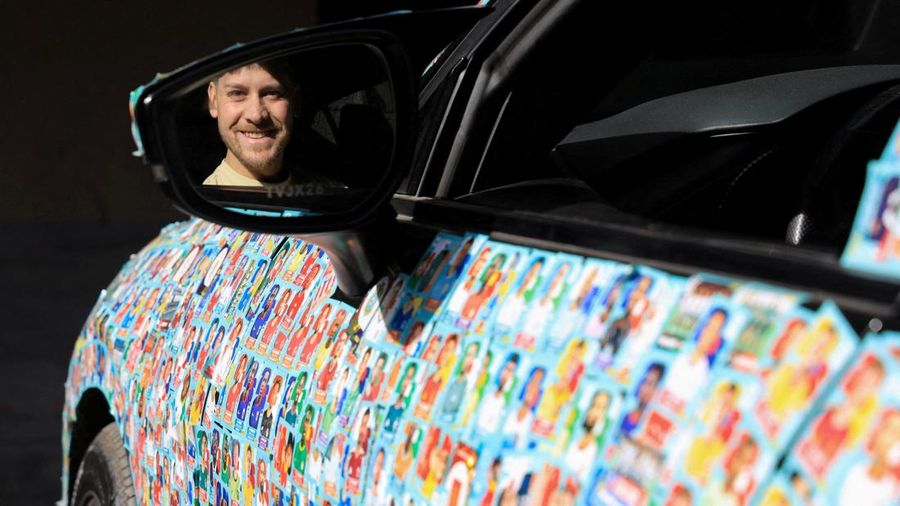 SOCCER-WORLDCUP/CHILE-STICKERS Chilean soccer fan and content creator Ariel Osses smiles while sitting in his car, which is covered with FIFA World Cup 2026 Panini stickers, fulfilling an updated version of his childhood dream of having a World Cup Panini album, in Santiago, Chile