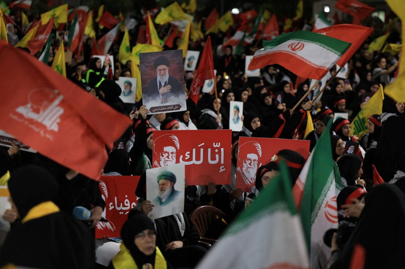 People carry the coffin of Iran's late Supreme Leader Ayatollah Ali Khamenei, who was killed on February 28 in Israeli and U.S. airstrikes, after it was unloaded from a refrigeration vehicle, during his funeral procession, in Karbala, Iraq, July 9, 2026. REUTERS/Ahmed Saad