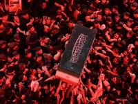 People carry the coffin of Iran's late Supreme Leader Ayatollah Ali Khamenei, who was killed on February 28 in Israeli and U.S. airstrikes, after it was unloaded from a refrigeration vehicle, during his funeral procession, in Karbala, Iraq, July 9, 2