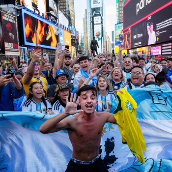 Soccer Football - FIFA World Cup 2026 - Argentina Fans gather in Times Square, New York - New York, New York, U.S. - June 15, 2026 A man holds a Brazil shirt as Argentina fans gather in Times Square REUTERS/Carolina Herrera     TPX IMAGES OF THE DAY