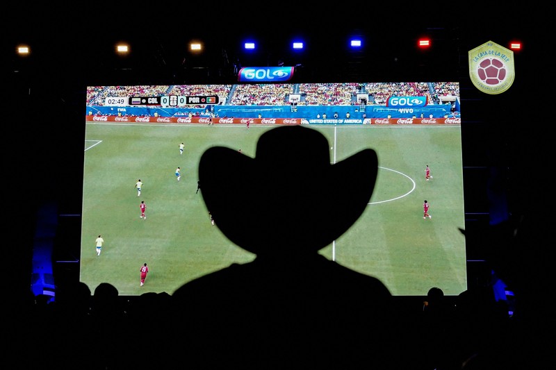 Soccer Football - FIFA World Cup 2026 - Mexico v South Africa -  Fans gather in Mexico City - Zocalo, Mexico City, Mexico - June 11, 2026 - A giant FIFA World Cup 2026 ball behind Mexico fans reacting as they watch the match REUTERS/Marian Carrasquero     TPX IMAGES OF THE DAY          SEARCH