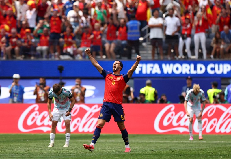 Mikel Merino merayakan kemenangan usai pertandingan yang memastikan Spanyol lolos ke semifinal Piala Dunia FIFA 2026 setelah mengalahkan Belgia pada perempat final di Los Angeles Stadium, Inglewood, California, Amerika Serikat, Jumat (10/7/2026). (IMAGN IMAGES via Reuters/Jessie Alcheh)