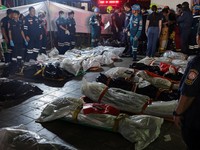 Sebanyak 27 orang tewas dalam kebakaran besar di sebuah bar di Bangkok, Thailand, pada Minggu (12/7/2026) malam waktu setempat. Selain puluhan korban tewas, puluhan orang lainnya juga terluka. (via REUTERS/BANGKOK RESCUE WORKERS GROUP)