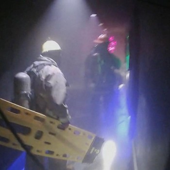 Sebanyak 27 orang tewas dalam kebakaran besar di sebuah bar di Bangkok, Thailand, pada Minggu (12/7/2026) malam waktu setempat. Selain puluhan korban tewas, puluhan orang lainnya juga terluka. (via REUTERS/BANGKOK RESCUE WORKERS GROUP)