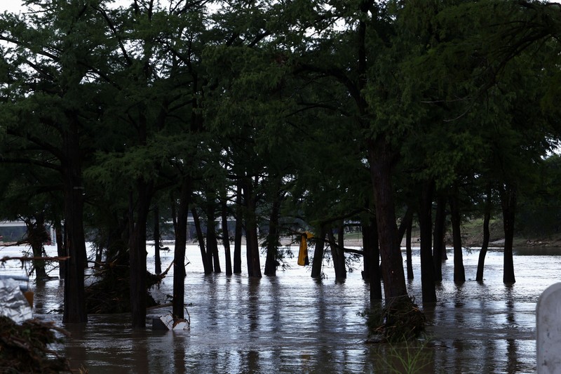 Banjir katastrofik kembali melanda Texas Tengah akibat meluapnya Sungai Guadalupe., Jumat (17/7/2026). (REUTERS/Kaylee Greenlee)