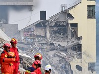 Longsor menerjang Kabupaten Otonom Pengshui Miao dan Tujia di Chongqing, China, pada Jumat (17/7/2026) pagi. (VIA REUTERS/cnsphoto)
