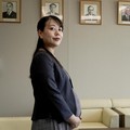 Wali Kota Yawata, Shoko Kawata, berpose untuk foto di depan potret mantan wali kota Yawata di Balai Kota Yawata, Yawata, Prefektur Kyoto, Jepang, 17 Juli 2026. (REUTERS/Joseph Campbell)