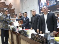 Komisi XI DPR RI bersama pemerintah menyepakati Rancangan Undang-Undang (RUU) tentang Pusat Finansial Internasional Indonesia (PFII) untuk dilanjutkan ke Pembicaraan Tingkat II dalam Rapat Paripurna DPR RI, Jakarta, Senin (20/7/2026). (Dok. DPR RI)