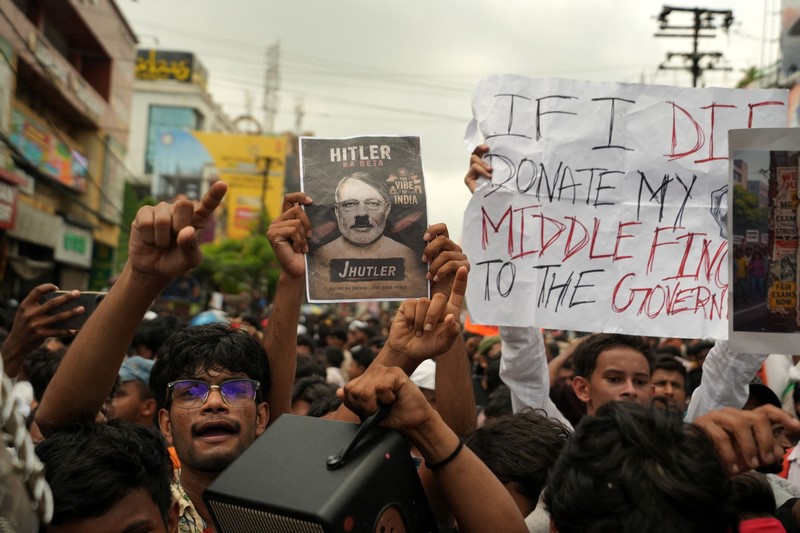 Para pendukung Partai Janata Kecoa (CJP) India melanjutkan protes mereka di New Delhi, Rabu (22/7/2026). (REUTERS/Adnan Abidi)