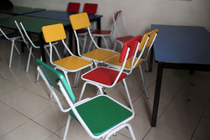 Para siswa di sebuah sekolah untuk pengungsi berpartisipasi dalam kegiatan pembelajaran di tengah lonjakan ujaran kebencian daring yang menargetkan komunitas Rohingya, di Kuala Lumpur, Malaysia, 13 Juli 2026. (REUTERS/Hasnoor Hussain)