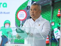 Menteri Perhubungan Dudy Purwagandhi memberi sambutan dalam kegiatan Pelatihan bertajuk Safer Roads, Stronger Communities  Jalan Lebih Aman, Komunitas Lebih Kuat  di Terminal Jati Jajar, Depok, Jawa Barat, Selasa (28/7/2026). (CNBC Indonesia/Tri Susi