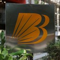 FILE PHOTO: Logo of Bank of Baroda is seen on a stand outside their branch office in New Delhi, India, June 20, 2023. REUTERS/Anushree Fadnavis/File Photo