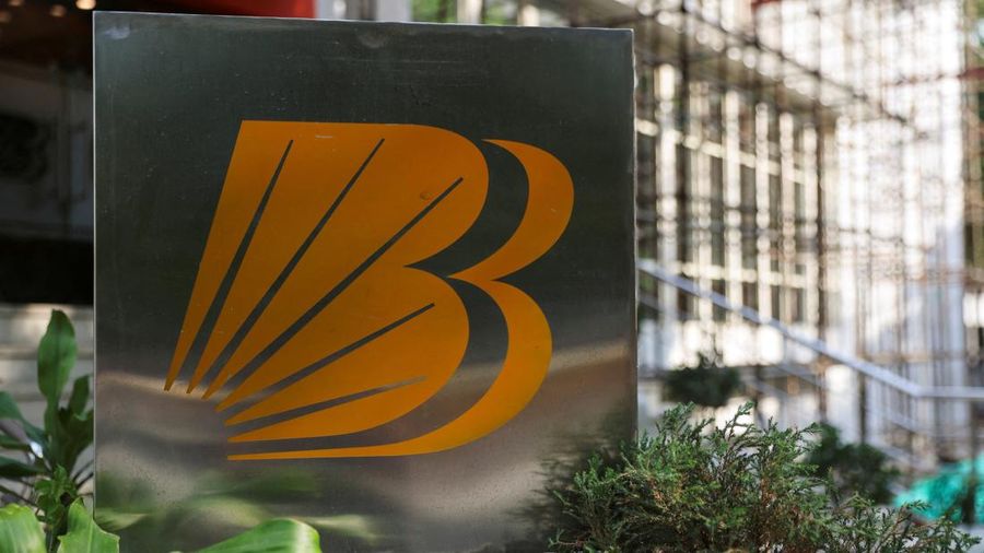 FILE PHOTO: Logo of Bank of Baroda is seen on a stand outside their branch office in New Delhi, India, June 20, 2023. REUTERS/Anushree Fadnavis/File Photo