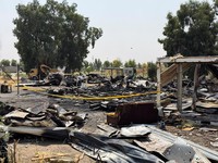 Damage at a site belonging to Iraq's Popular Mobilization Forces (PMF) following airstrikes that the PMF said were carried out by U.S. and Saudi forces, in Bartella, Nineveh province, Iraq, July 29, 2026. Picture taken with a mobile phone.REUTERS/Kha