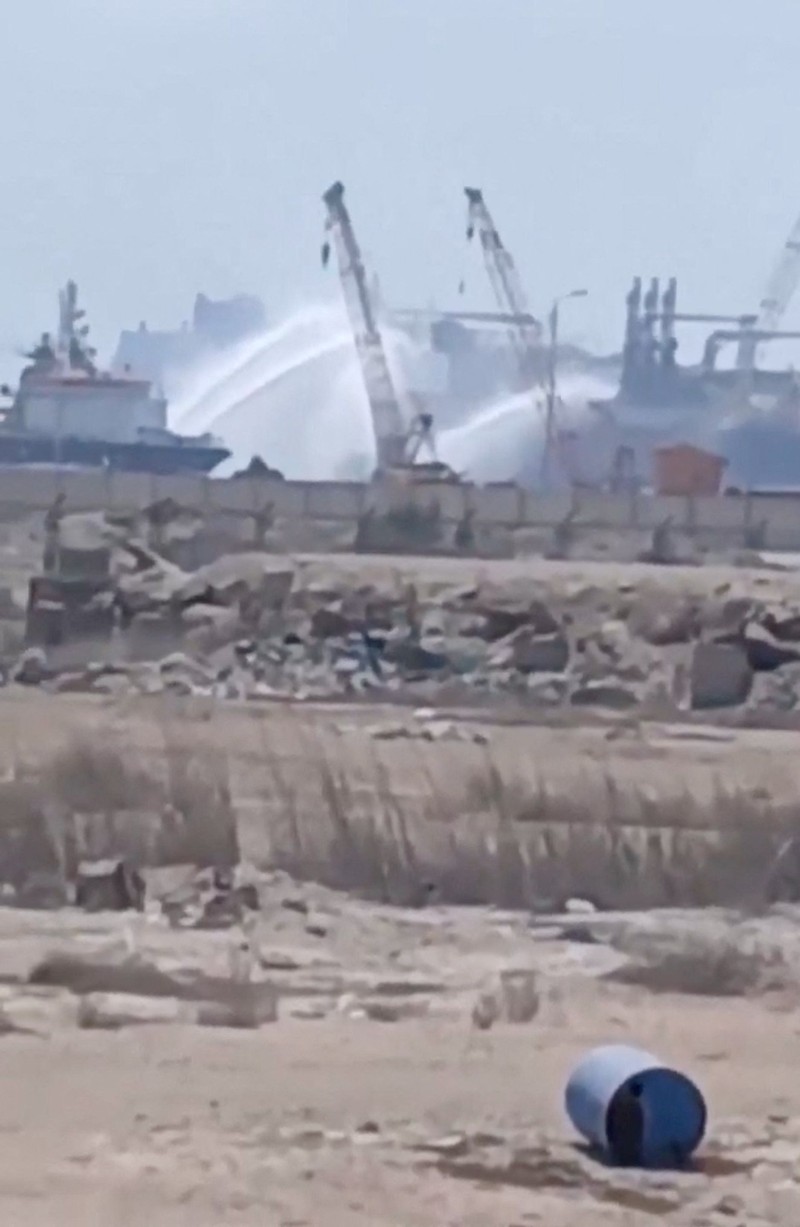 Water jets are fired at a gas tanker after a drone strike, maritime security firm Ambrey said, at Damietta port, Egypt, July 29, 2026, in this screengrab obtained from a social media video. SOCIAL MEDIA/via REUTERS  THIS IMAGE HAS BEEN SUPPLIED BY A THIRD PARTY. MANDATORY CREDIT. NO RESALES. NO ARCHIVES.  NEWS USE ONLY. BEST QUALITY AVAILABLE.  Verification line: Reuters was able to verify the location through the port infrastructure, storage tanks, and ship-tracking data, which matched archive and satellite imagery. The identity of the vessel was confirmed as ENERGOS WINTER (IMO: 9256614) based on the mast, hull, and foredeck, which matched archive imagery. The date was confirmed through corroborating media reports, and Egypt's Petroleum Ministry confirmed a fire at the port. No older versions of the videos were found posted online before July 29.