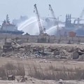 Water jets are fired at a gas tanker after a drone strike, maritime security firm Ambrey said, at Damietta port, Egypt, July 29, 2026, in this screengrab obtained from a social media video. SOCIAL MEDIA/via REUTERS  THIS IMAGE HAS BEEN SUPPLIED BY A