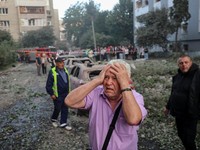 A man reacts near an apartment building hit by a Russian missile strike, amid Russia's attack on Ukraine, in Lviv, Ukraine July 30, 2026. REUTERS/Roman Baluk
