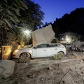 A view shows a damaged vehicle among boulders and debris after a magnitude 4.7 earthquake struck the Campi Flegrei area, in Pozzuoli, near Naples, Italy, July 31, 2026. REUTERS/Salvatore Laporta