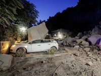 A view shows a damaged vehicle among boulders and debris after a magnitude 4.7 earthquake struck the Campi Flegrei area, in Pozzuoli, near Naples, Italy, July 31, 2026. REUTERS/Salvatore Laporta