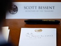 A notepad in front of U.S. Secretary of the Treasury Scott Bessent reads "To Do Buy Japanese Yen $5-10 bil" as he participates in a cabinet meeting at Camp David, Maryland, U.S., July 31, 2026. The note, photographed at 11:33 EDT, came after Reuters
