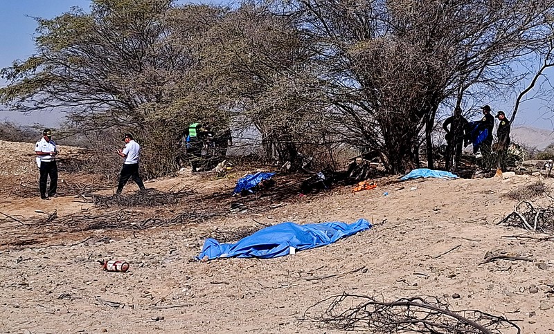 Authorities work in the area where a small aircraft carrying tourists from Germany, Italy and Spain crashed as it flew over the Nazca Lines archaeological site, in Nazca, Peru August 1, 2026. REUTERS/Elvis Comasongo