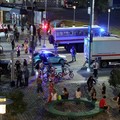 Law enforcement officers and emergency services personnel near the site of an explosion at a restaurant in central Moscow, Russia August 1, 2026. REUTERS/Anastasia Barashkova