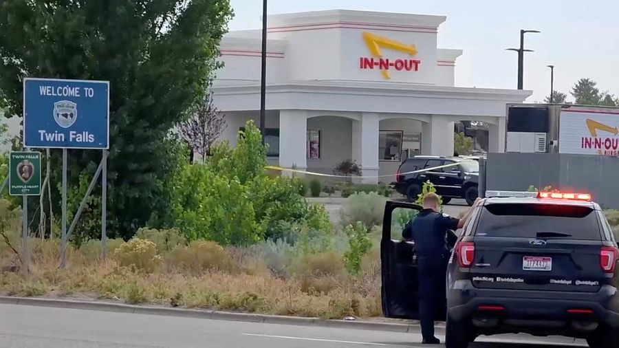 A vehicle behind yellow tape at the site of a fatal shooting incident in Twin Falls, Idaho, U.S., August 1, 2026, in this still image obtained from a video. (ABC AFFILIATE KIVI/Handout via REUTERS)