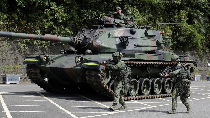 Para prajurit berpartisipasi dalam misi pertahanan untuk sebuah pelabuhan vital selama latihan militer tahunan Han Kuang di Yilan, Taiwan timur laut, pada hari Senin, 10 Agustus 2026.