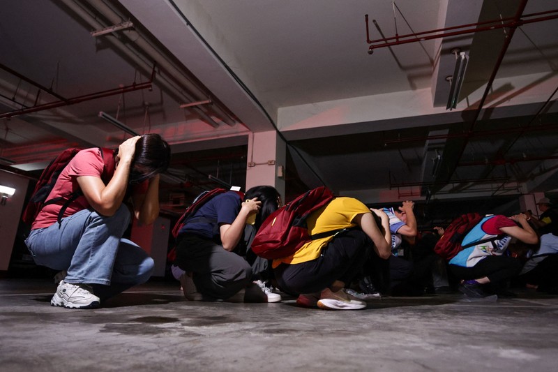 Para prajurit berpartisipasi dalam misi pertahanan untuk sebuah pelabuhan vital selama latihan militer tahunan Han Kuang di Yilan, Taiwan timur laut, pada hari Senin, 10 Agustus 2026. (Chiang Ying-ying/Pool via REUTERS)