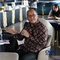 Pelaksana Tugas (Plt.) Direktur Utama PT Mandiri Utama Finance, Dapot Parasian S. Sinaga saat menyampaikan pemaparan dalam Multifinance CEO Gathering 2026 di Jakarta, Selasa (11/8/2026). (CNBC Indonesia/Tri Susilo)