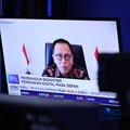Kepala Eksekutif Pengawas Perbankan OJK, Dian Ediana Rae menyampaikan pemaparan melalui zoom meeting dalam Digital Banking Forum 2026 di Jakarta, Kamis (13/8/2026). (CNBC Indonesia/Tri Susilo)