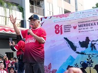 Ribuan warga menghadiri kegiatan penanaman pohon dalam rangka menyambut HUT ke-81 Kemerdekaan Indonesia di Embung Sanggai, Kawasan Inti Pusat Pemerintahan (KIPP) IKN, Penajam Paser Utara, Kalimantan Timur, Sabtu (15/8/2026). (CNBC Indonesia/Tias Budi