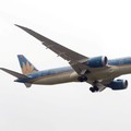 FILE PHOTO: A Vietnam Airlines Boeing 787-9 Dreamliner airplane prepares for landing at Noi Bai international airport in Hanoi, Vietnam March 7, 2017. REUTERS/Kham/File Photo