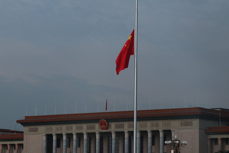 The Chinese flag at Tiananmen Square flies at half-mast in memory of late Former Chinese Premier Zhu Rongji who passed away last Wednesday aged 97, in Beijing, China, August 18, 2026. REUTERS/Maxim Shemetov