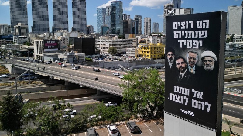A drone view of an election billboard by Benjamin Netanyahu's Likud Party depicting Iran's Supreme Leader Mojtaba Khamenei, New York City Mayor Zohran Mamdani, Turkish President Tayyip Erdogan and Hezbollah chief Naim Qassem and a text in Hebrew that