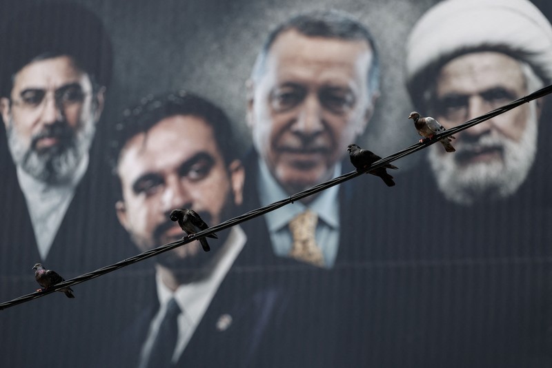 A drone view of an election billboard by Benjamin Netanyahu's Likud Party depicting Iran's Supreme Leader Mojtaba Khamenei, New York City Mayor Zohran Mamdani, Turkish President Tayyip Erdogan and Hezbollah chief Naim Qassem and a text in Hebrew that reads